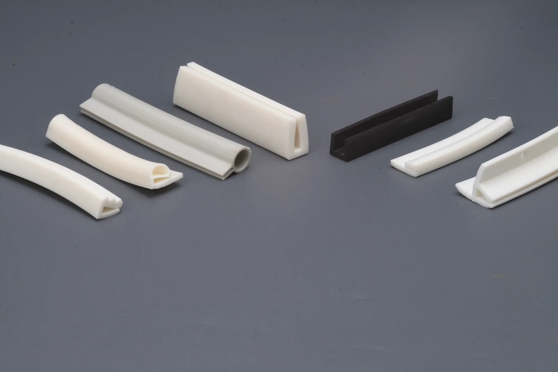 White bulb seal and black channel extrusions